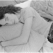 JUDY LINN, Patti hugs pillow, early 1970s, silver gelatine print