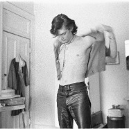 JUDY LINN, Robert gets dressed at the Chelsea, 1970, silver gelatin print